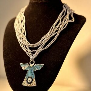 Elegant Gold Tone and Blue Pendant Necklace